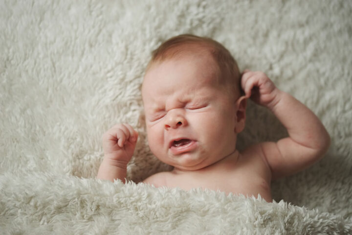 newborn baby sneezing