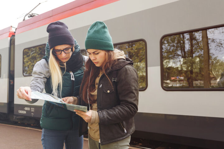 two women on a train platform