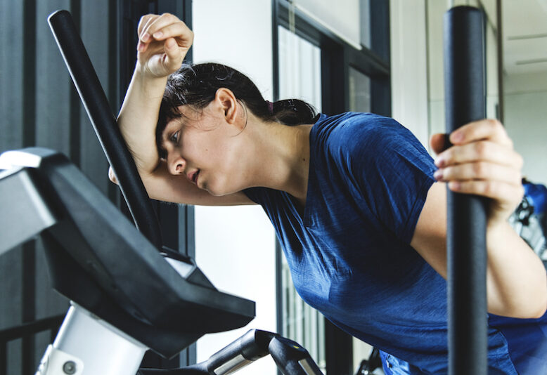 Woman tired after strenuous exercise