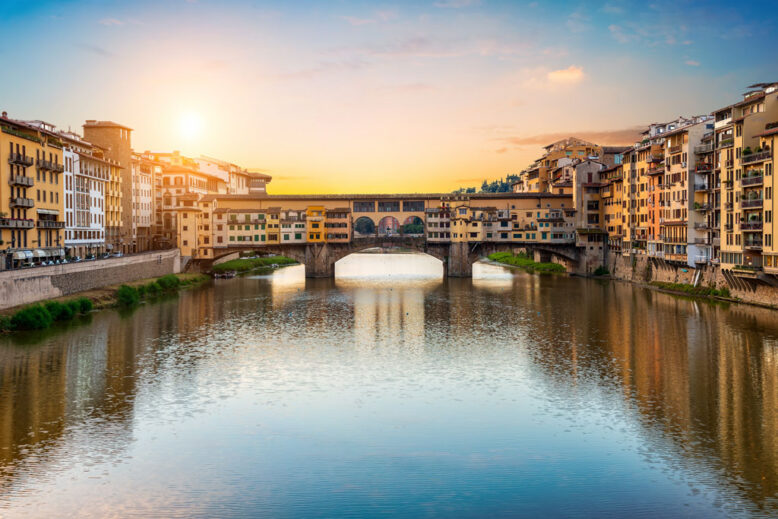 Morning sun over Vecchio bridge in Florence