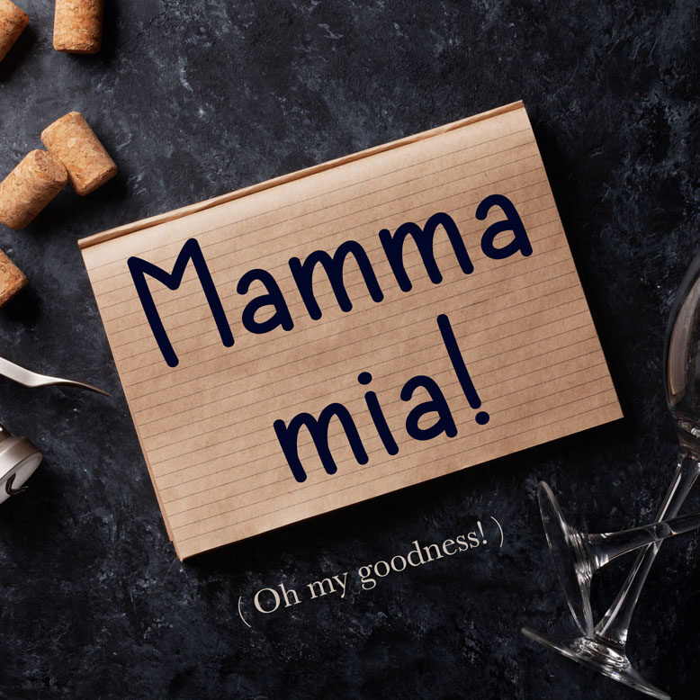 cover image with the phrase “mamma mia” and its translation written on a notepad