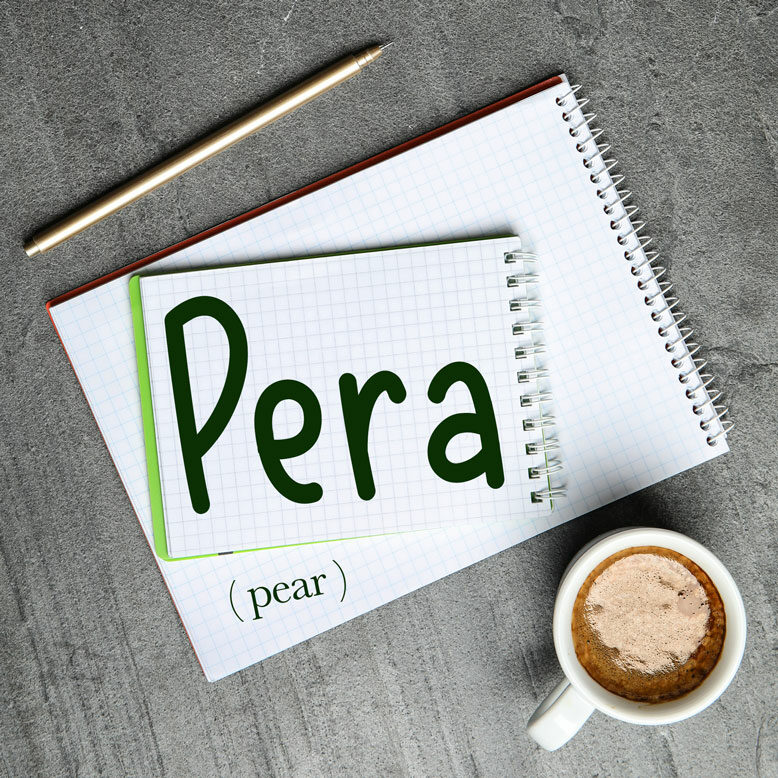 cover image with the word “pera” and its translation written on a notepad next to a cup of cofee