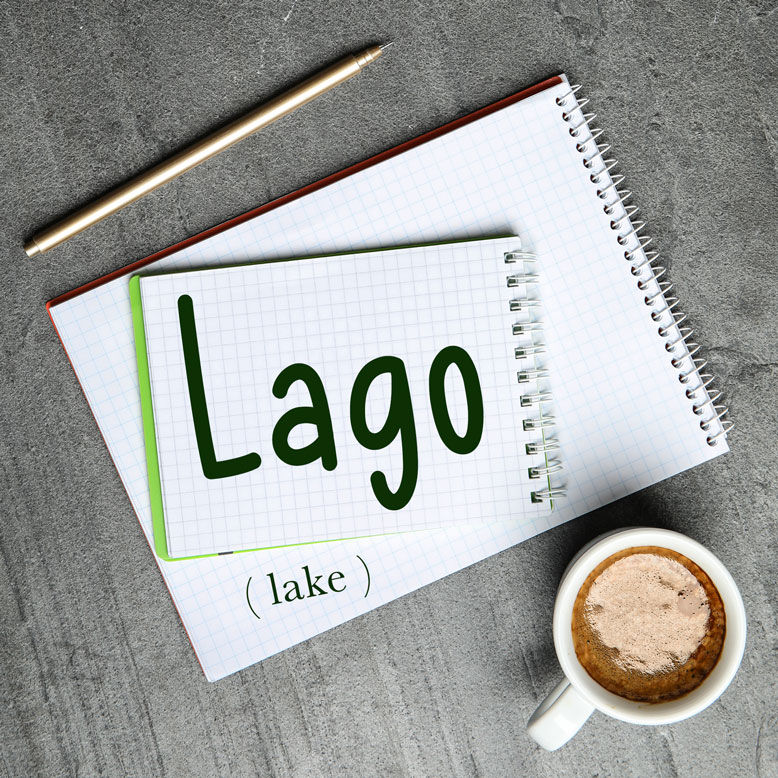 cover image with the word “lago” and its translation written on a notepad next to a cup of coffee