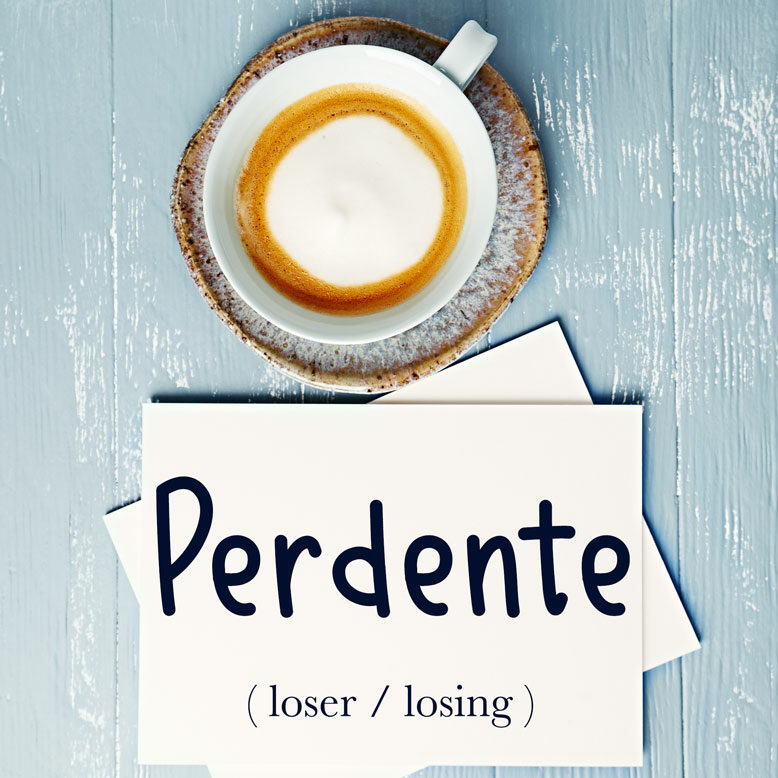 cover image with the word “perdente” and its translation written on a notepad next to a cup of coffee