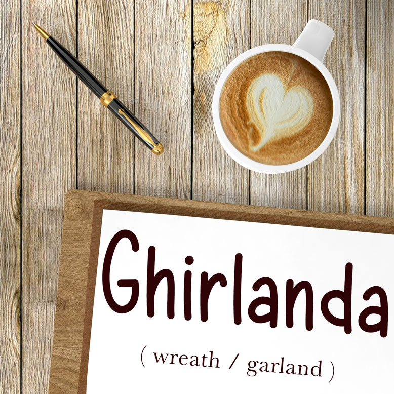 cover image with the word “ghirlanda” and its translation written on a notepad next to a cup of coffee