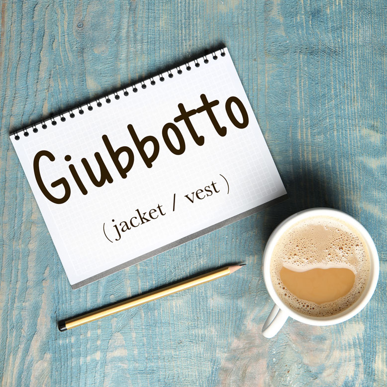 cover image with the word “giubbotto” and its translation written on a notepad next to a cup of coffee