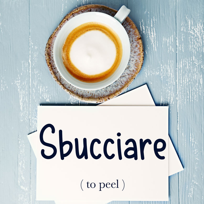 cover image with the word “sbucciare” and its translation written on a notepad next to a cup of coffee