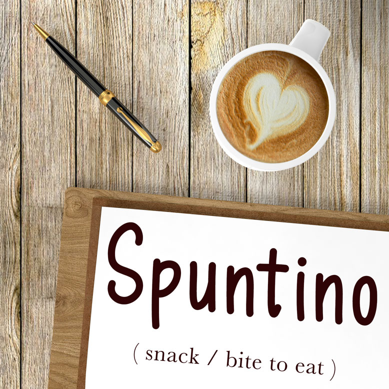 cover image with the word “spuntino” and its translation written on a notepad next to a cup of coffee