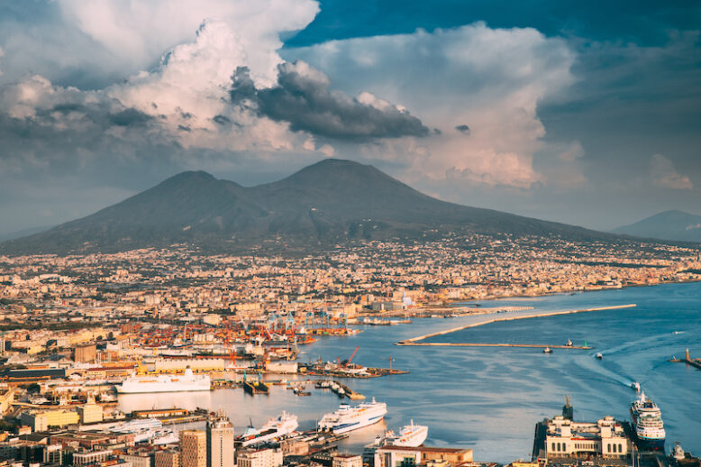 Naples, Italy. Top View Cityscape Skyline Of Naples With Mount Vesuvius And Gulf Of Naples In Background.