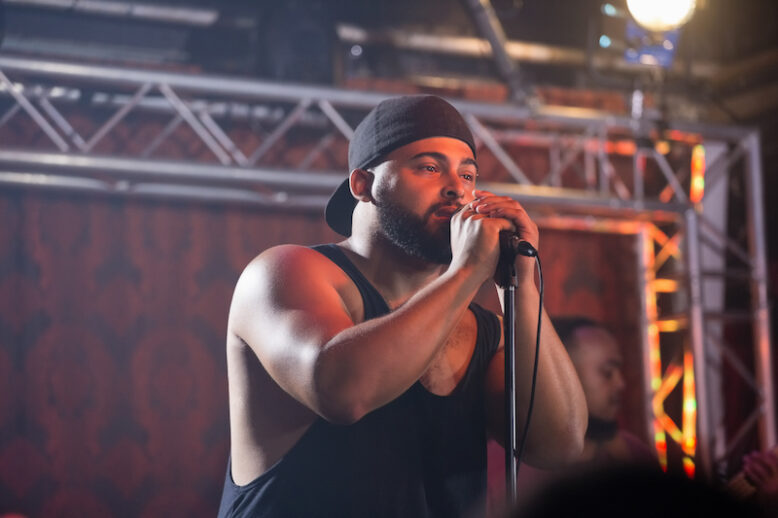 Singer performing on stage in nightclub