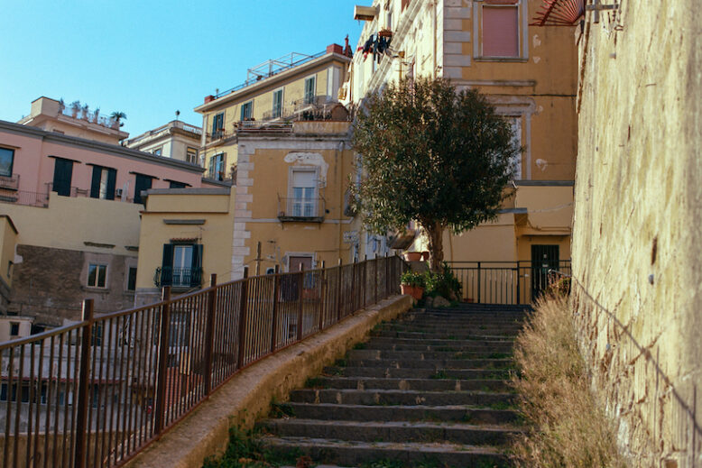 Naples view with old houses and ancient stone stairs leading up. Neapolitan architecture, Italy