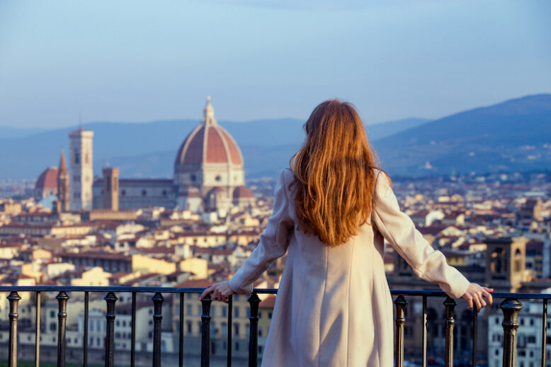 girl looking at the city of Florence from the viewpoint