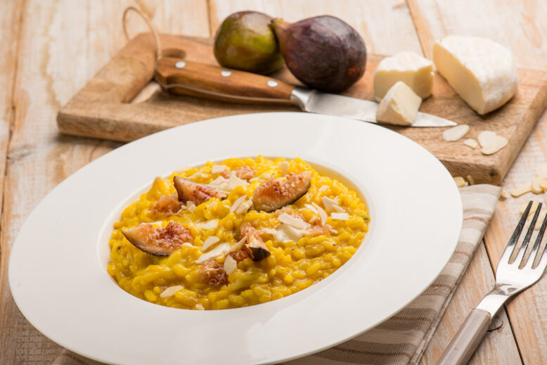 milanese risotto with cheese fig and sliced almond