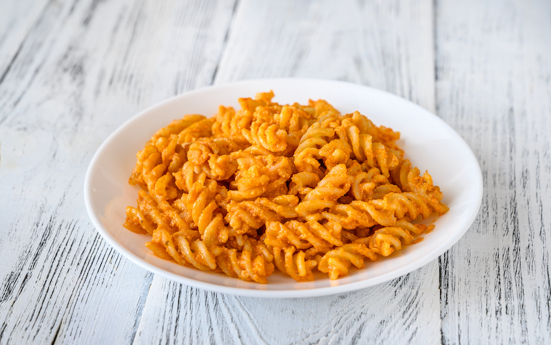 Portion of fusilli with tomato pesto