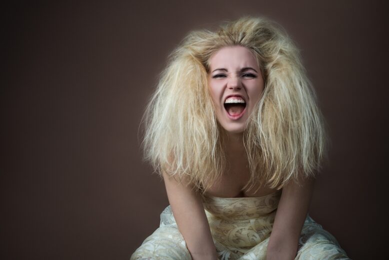 Young blonde woman with a mop of hair