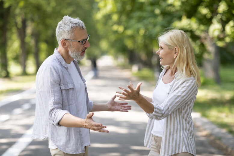 Portrait Of Mature Couple Arguing Outdoors