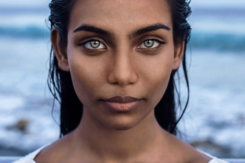 Portrait of maldivian woman with blue eyes