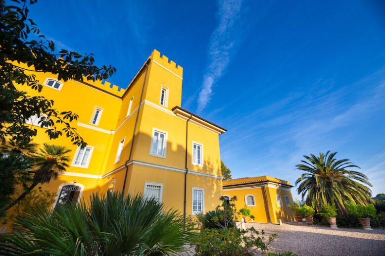 Old large yellow villa in the Tuscany region.