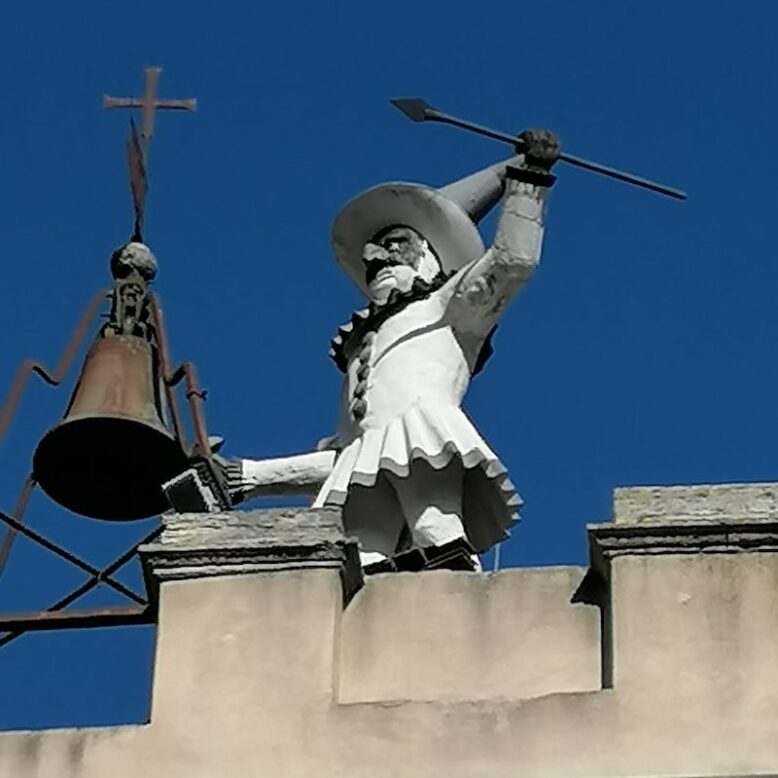pulcinella clock in montepulciano