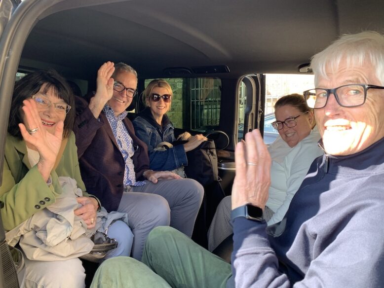 group waving goodbye