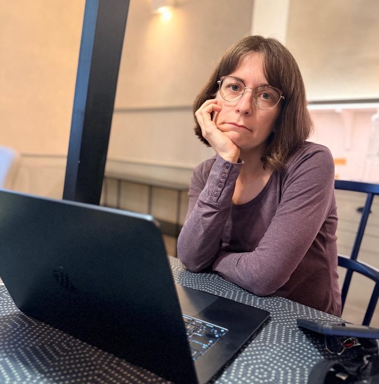 Bored person in front of a laptop
